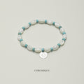 White Shell Bead & Green Agate Bracelet | Silver Tag